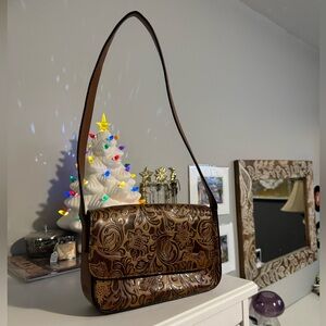 brown embossed floral bag